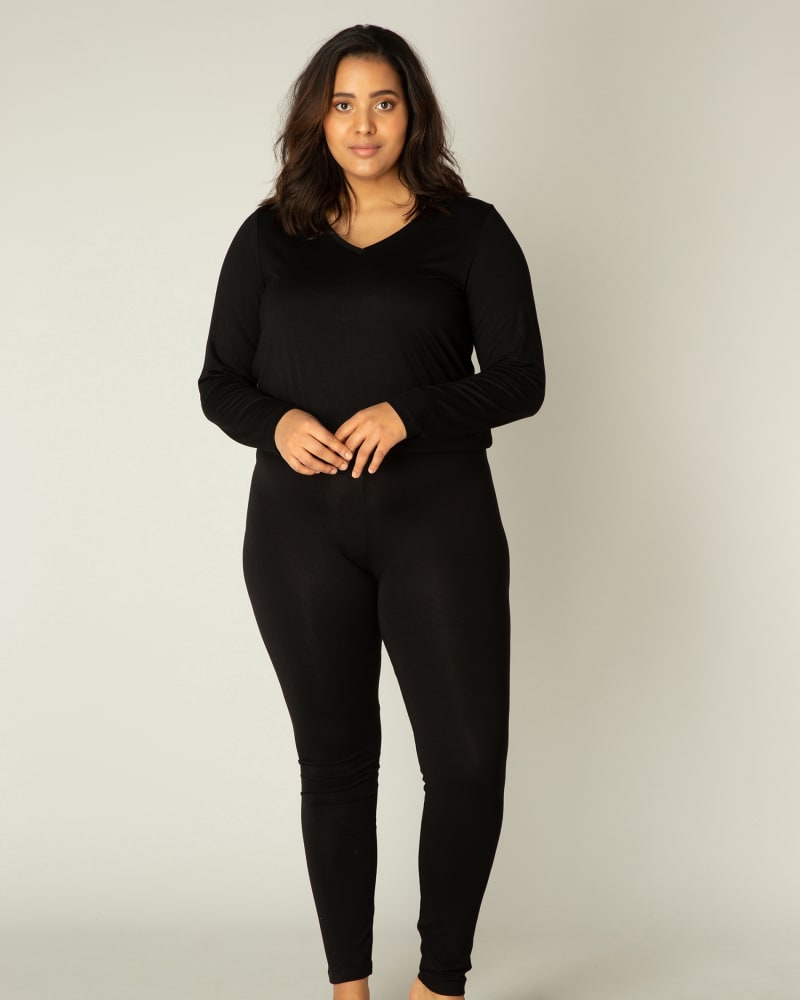 Front of a model wearing a size 0(46) Andrea in Black by Base Level Curvy. | dia_product_style_image_id:279728